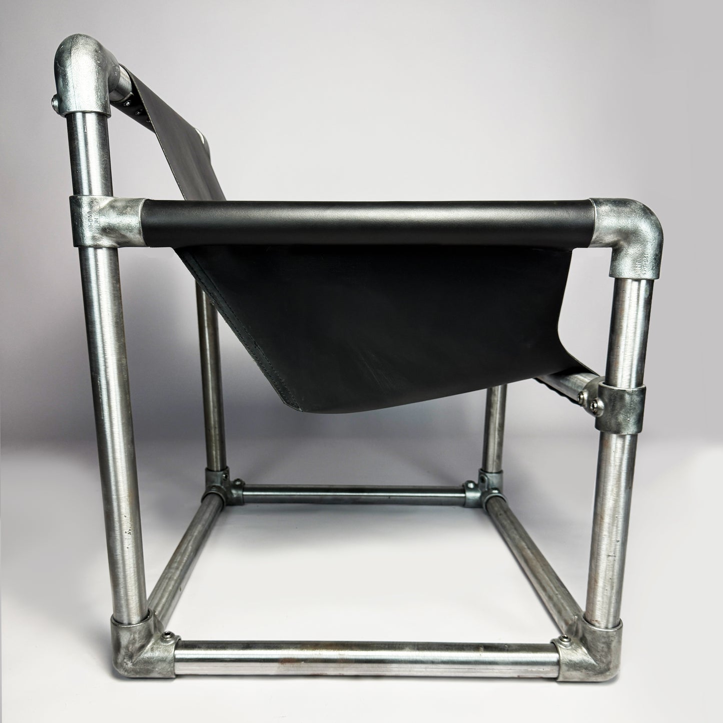 trefoil tension chair