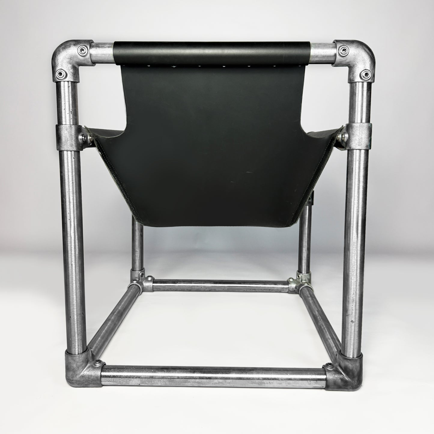 trefoil tension chair
